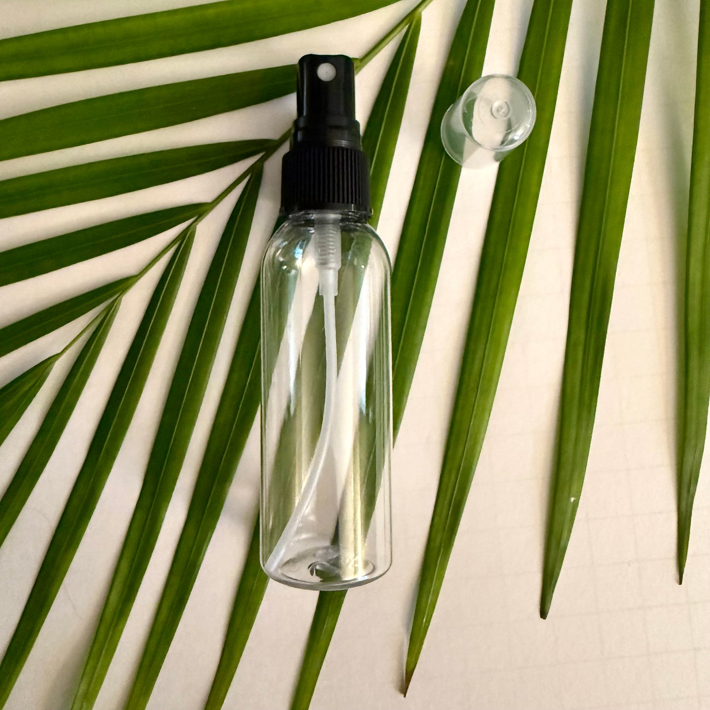 2 oz Clear Plastic Bottle with Fine Mist Sprayer Pump