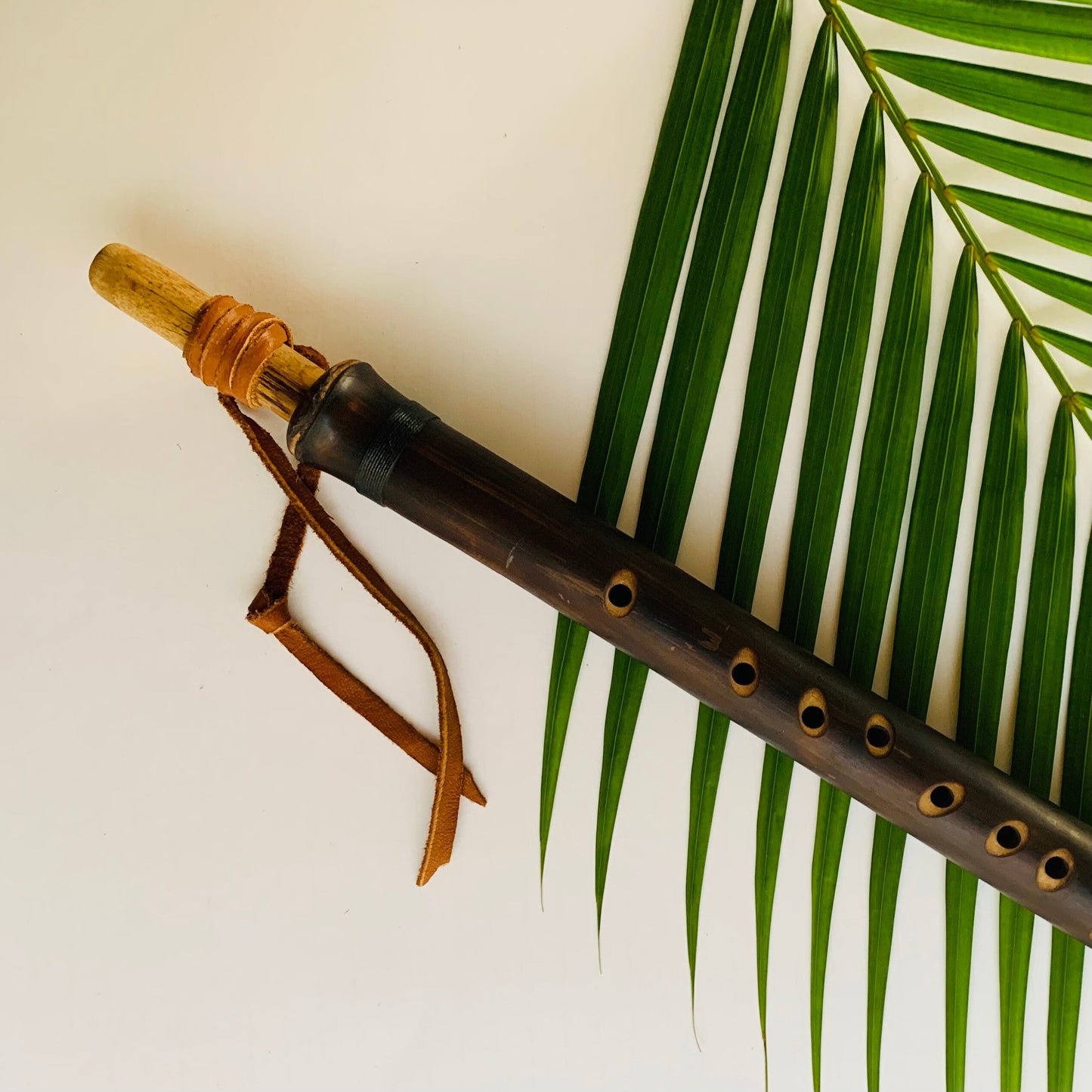 Native American style bamboo saxophone flute in the key of F with 1.5” Rico Reed