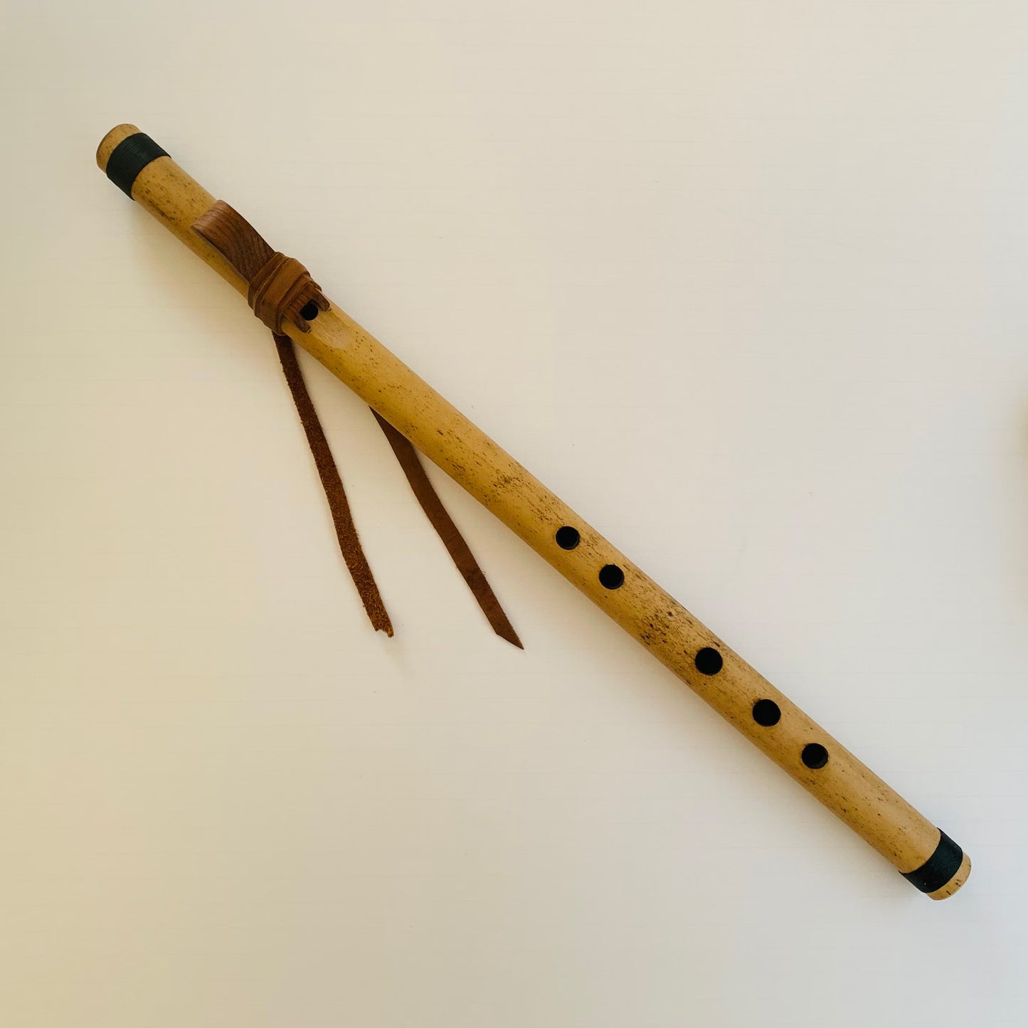 Native American style bamboo flute in the key of F