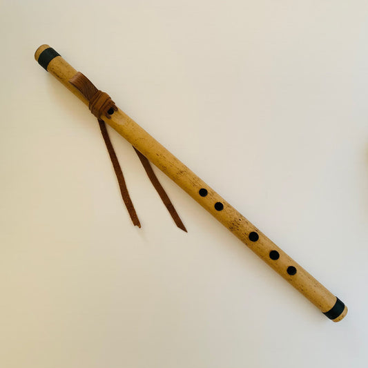 Native American style bamboo flute in the key of F