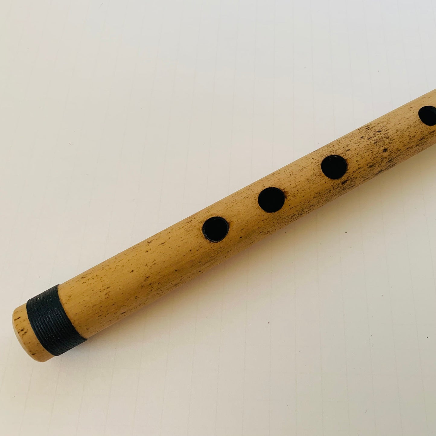 Native American style bamboo flute in the key of F