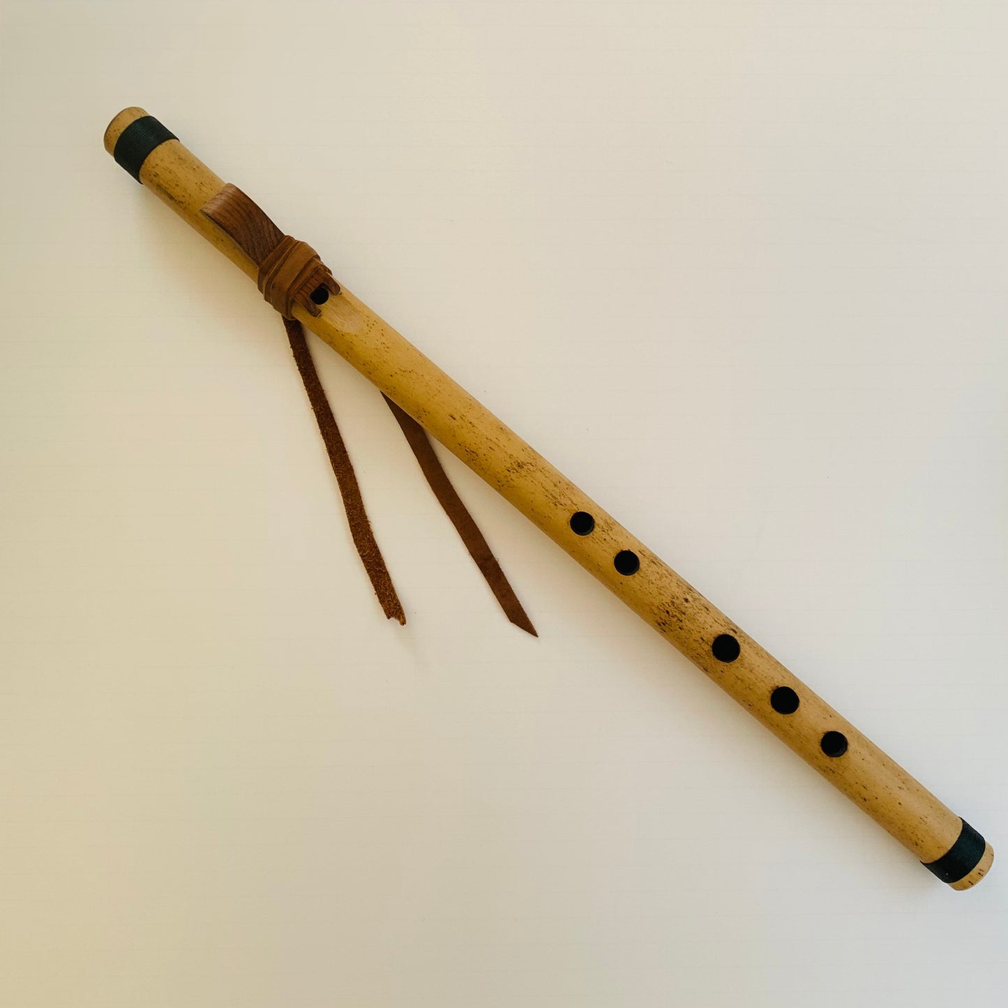 Native American style bamboo flute in the key of F