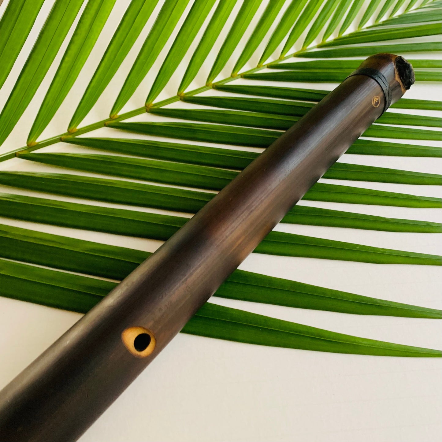 Native American style bamboo saxophone flute in the key of F with 1.5” Rico Reed