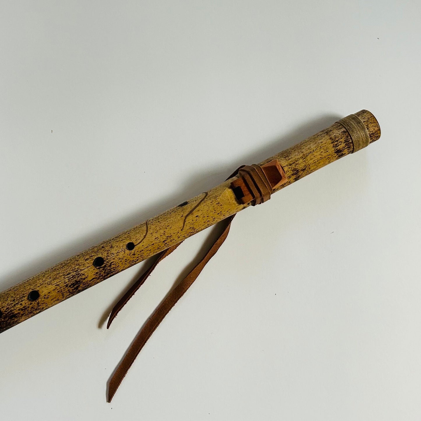 Native American style bamboo flute in the key of A