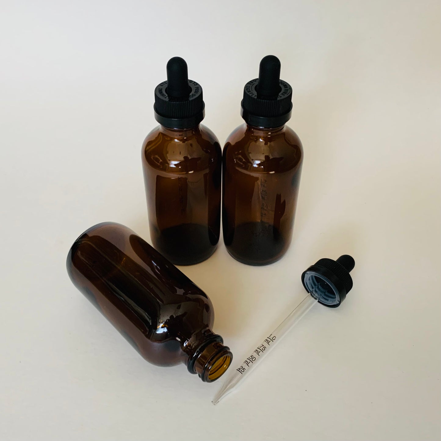 4 oz Amber Boston Round Glass Dropper Bottle with Child Resistant Cap and Graduated Glass Dropper