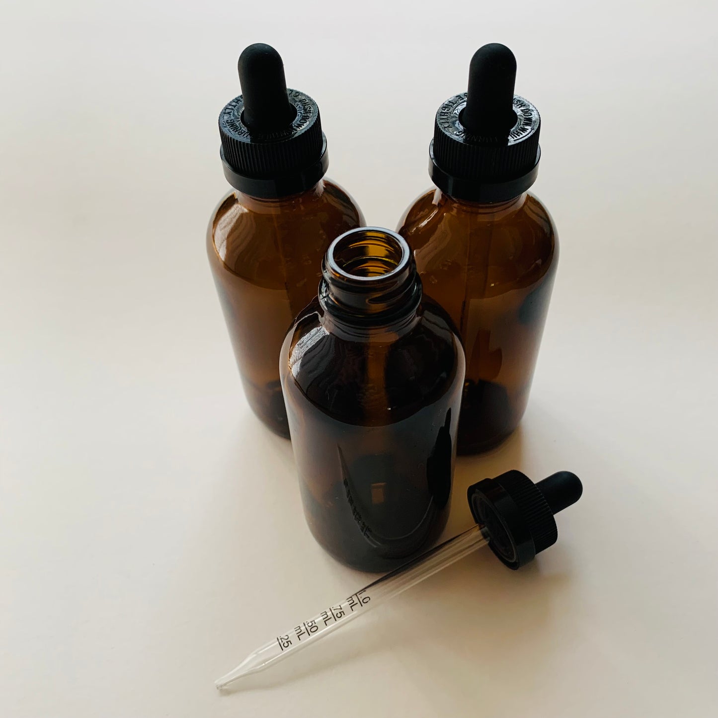 4 oz Amber Boston Round Glass Dropper Bottle with Child Resistant Cap and Graduated Glass Dropper