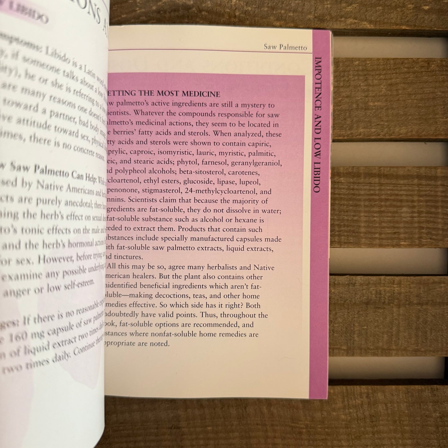 Open book on a wooden surface