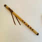 Native American style bamboo flute in the key of F